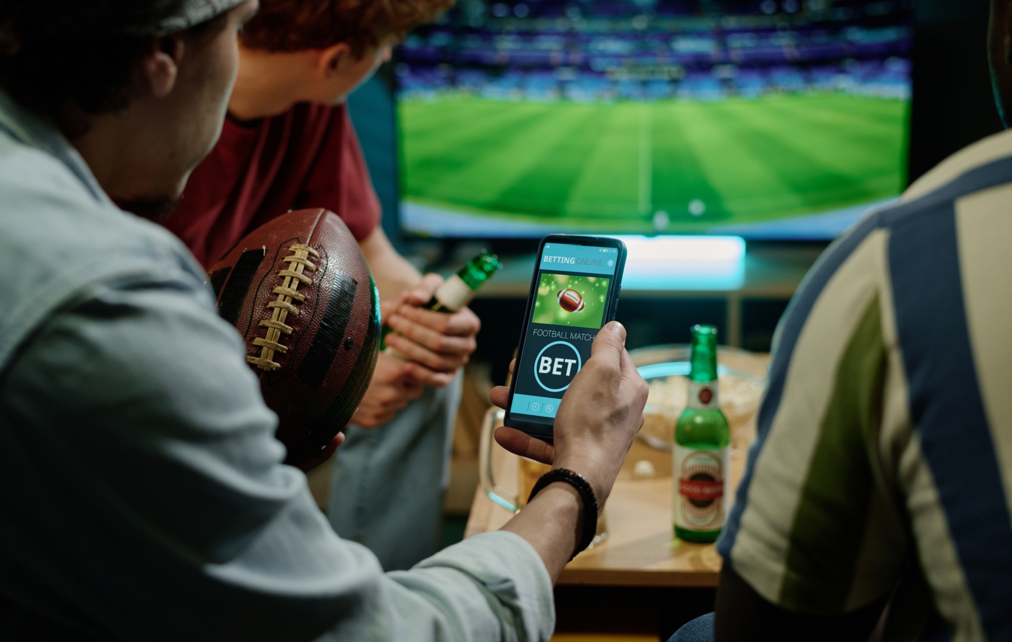 Sports fans following a live match on a mobile app